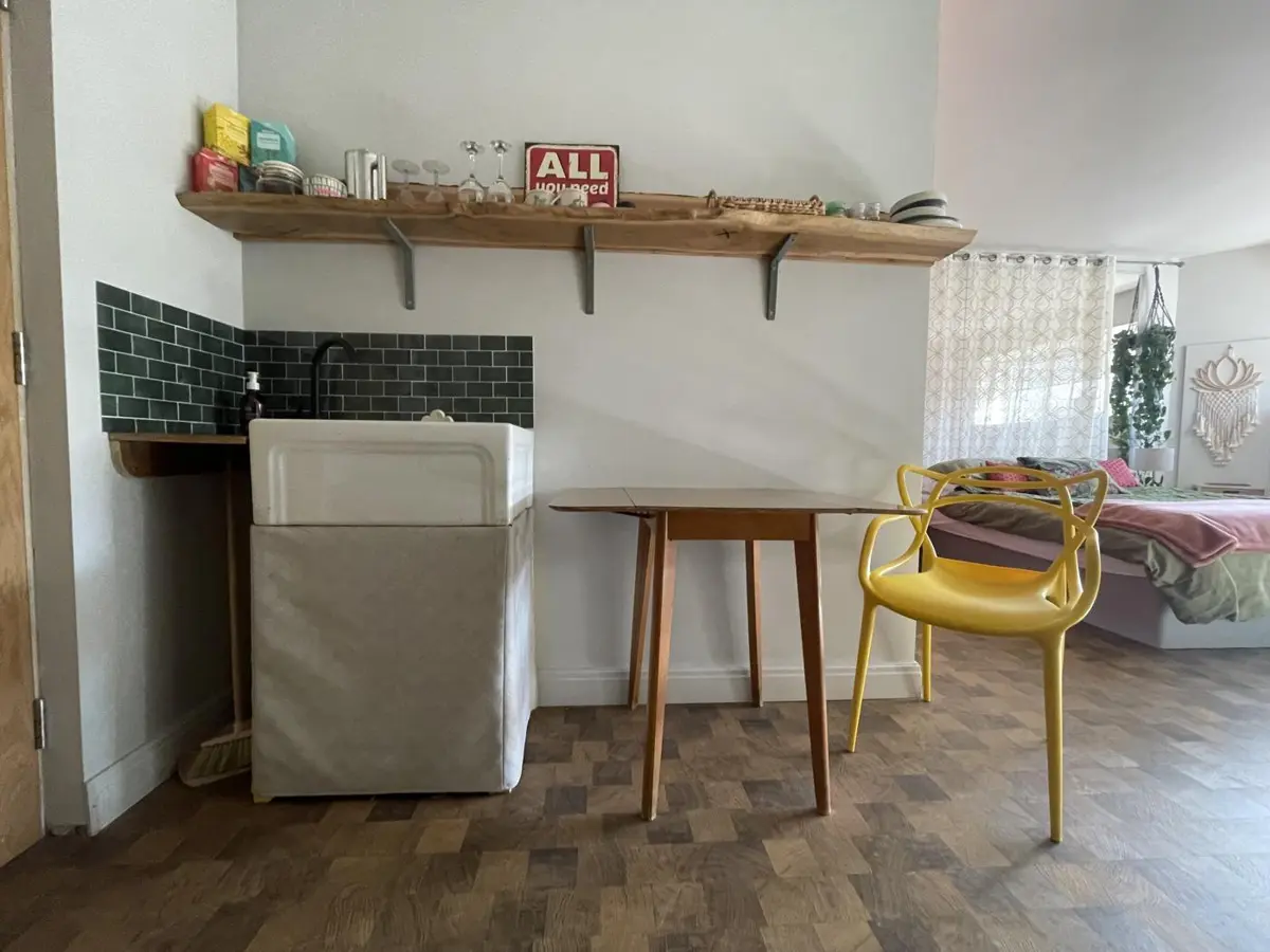 The kitchenette: butler sink, oak shelf and drop-leaf table